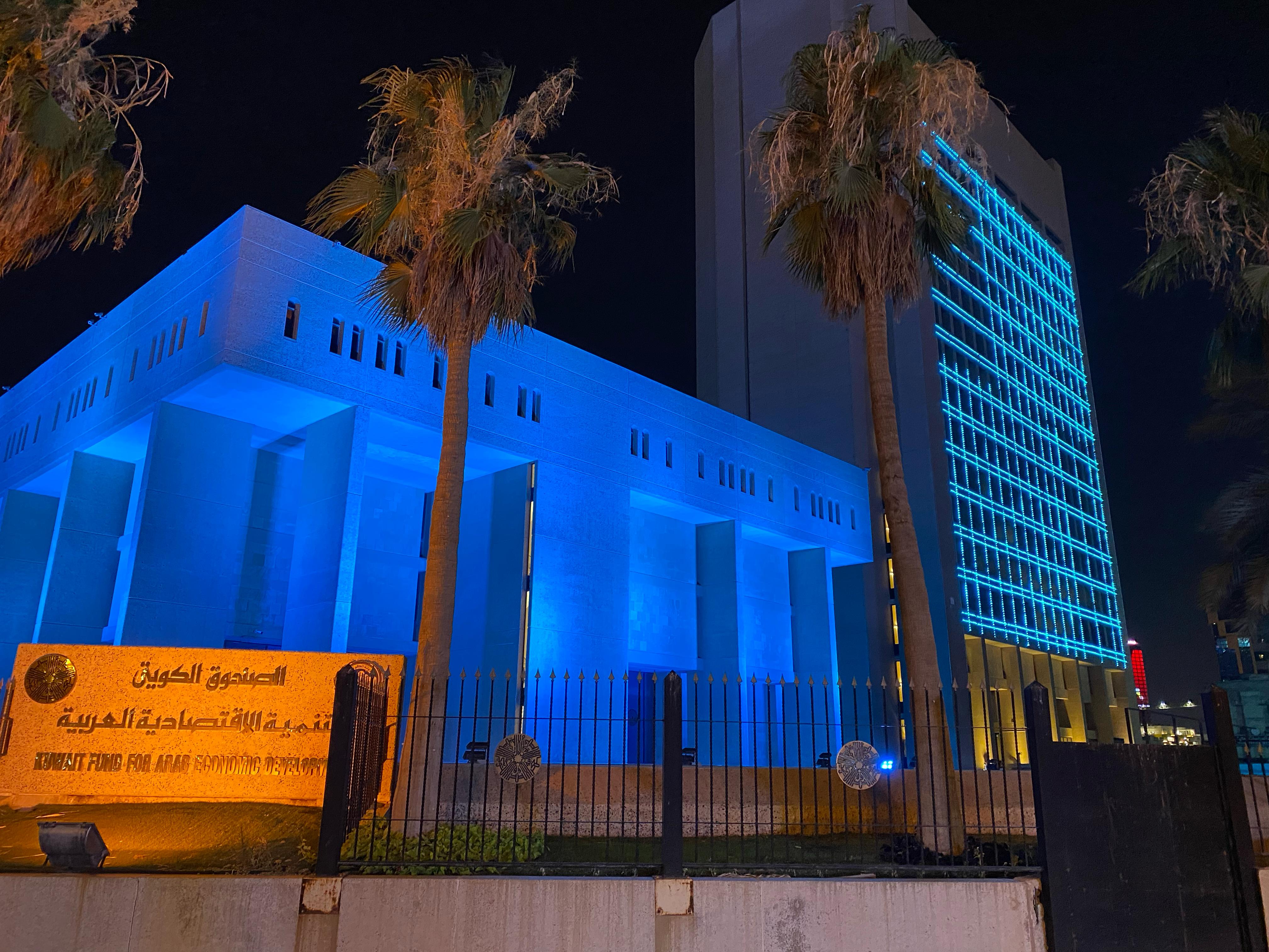 Kuwait Fund building lights up blue in solidarity with refugees around the world