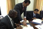 Signing A Loan Agreement In The Republic Of Sierra Leone