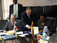Signing Of A Loan Agreement In Uganda